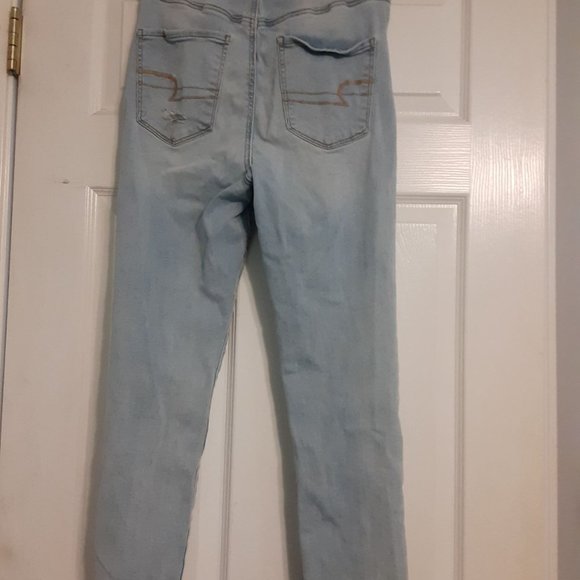 Women's American Eagle Next Level Stretch Light Wash Ripped Skinny Jeans - Picture 3 of 6